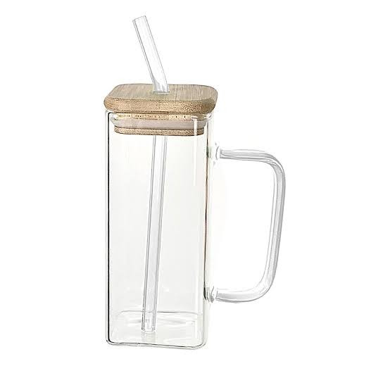 Glass jar with straw